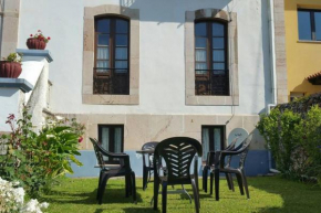 CASA NOGALES junto a PLAYA DE POO y SENDA. WIFI